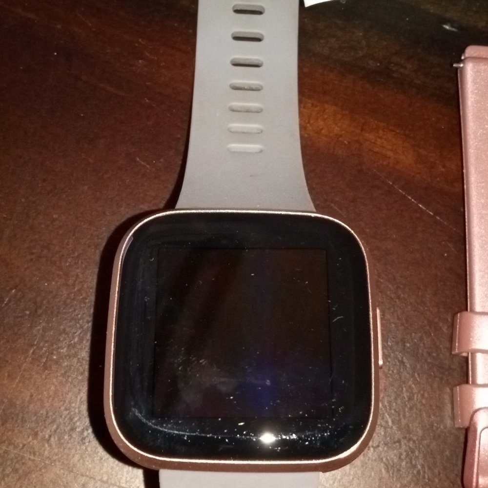 Versa Fitbit 2 watch with extra colored bands